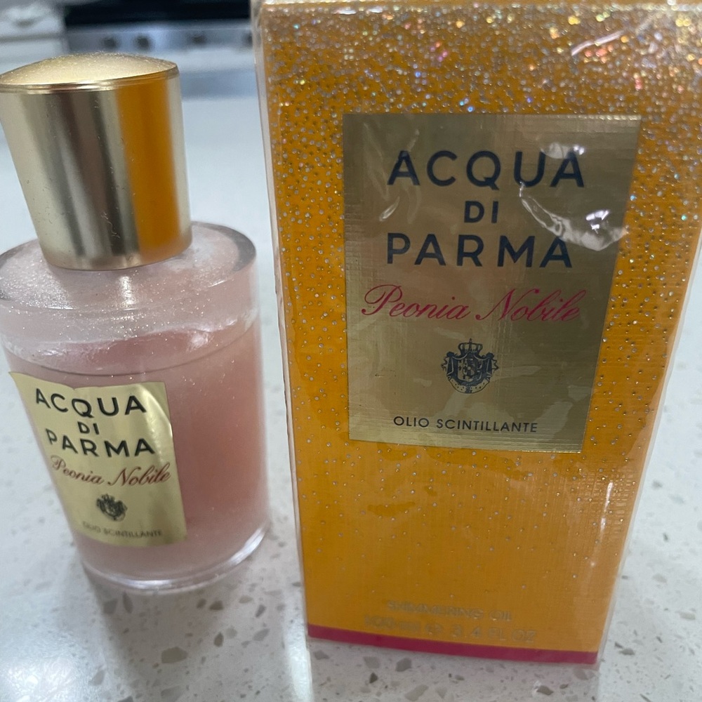 1 New, 1 used Acqua di Parma perfume